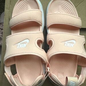 pink Nike sandals